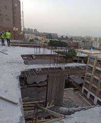 وزيرة التنمية: إزالة عدد من الأدوار المخالفة لتراخيص البناء في بعض العقارات بحي الزيتون بالقاهرة